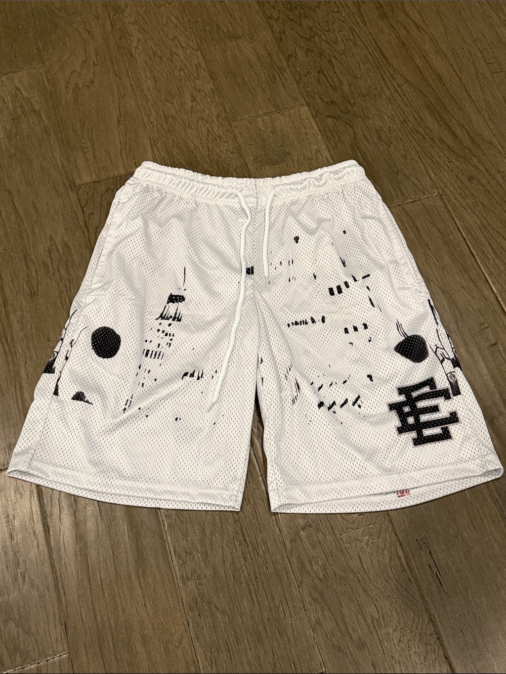 White Men's Mesh Athletic Eric Emmanual Shorts with Black Graphic